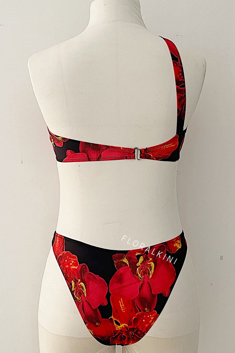 Tropical One Shoulder One Piece Swimsuit With Gold Spiral Hardware Details