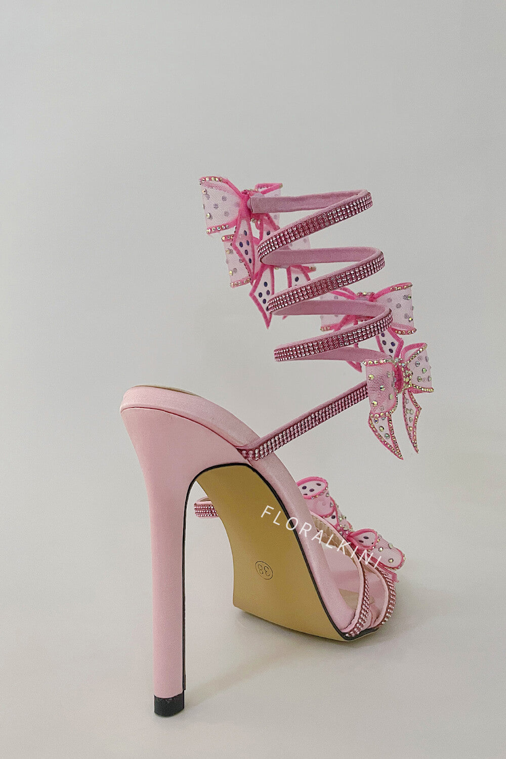 Crystal-Embellished Bow Around The Ankle Coil Stiletto Sandals